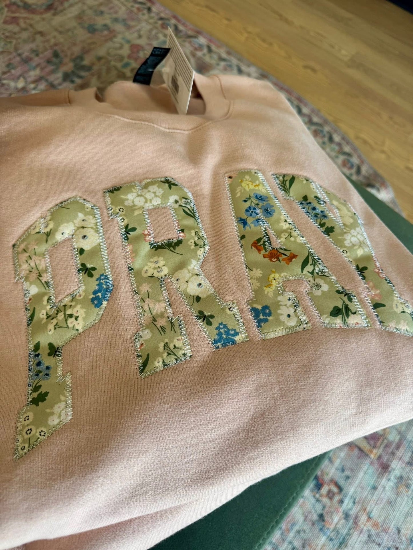 Embroidered Floral Pray Crewneck